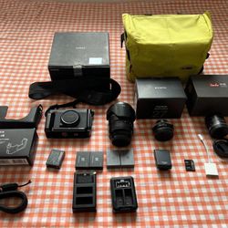 Full set of black Fujifilm X-E4 camera
