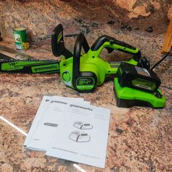 Brand New 12In  Chainsaw With 4AH 24V. Battery And Charger 
