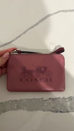 Coach Corner Zip Wristlet in a pink "Rouge"