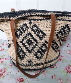 Woven Straw Tote Bag with Black Pattern and Brown Straps
