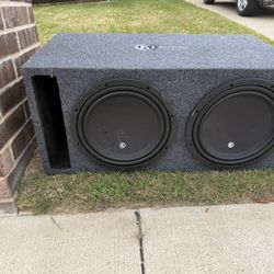 Memphis Car Audio dual 12” subwoofer setup in a ported enclosure.