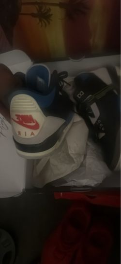 Jordan 3s and red Nikes