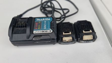 Cargador y 2 baterias Makita