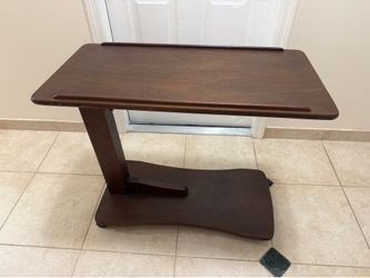 Rolling table with wheels