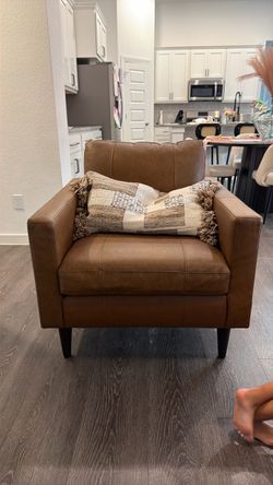 Brown leather accent chair