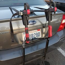 One Bicycle Carrier Mounts On Your Trunk
