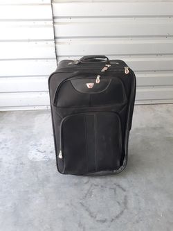 American Standard Rolling Suitcaee