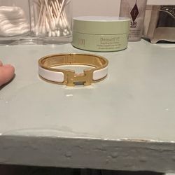 Hermes Clic H Bracelet, size PM, Gold Band with White detailing, minimal wear 