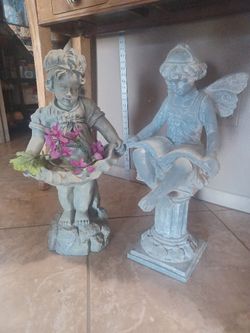 Lil' Girl Holding Basket Statue 21" Tall & Lil' Fairy Girl Reading Book 21" Tall. $80.00 each