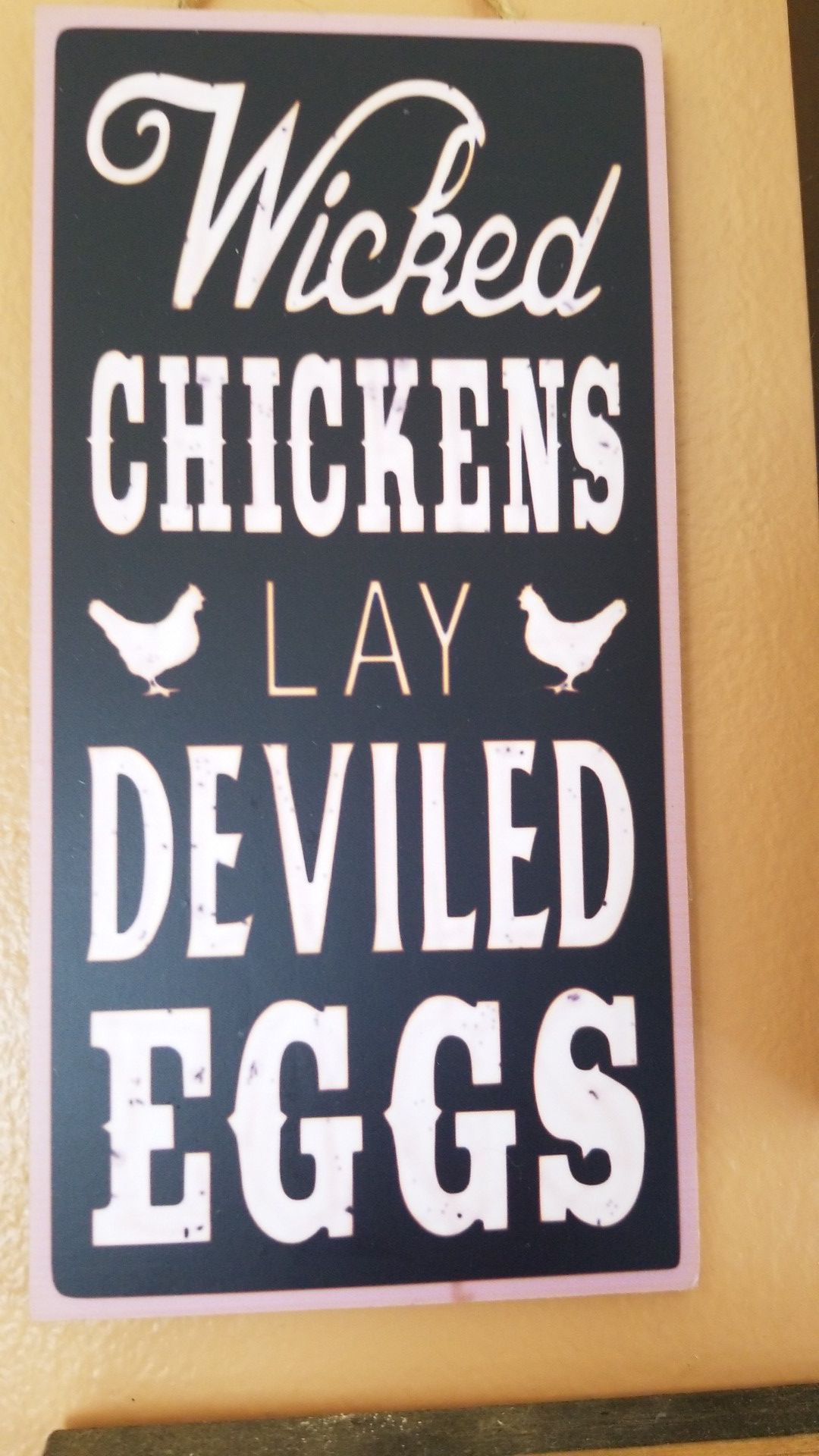 Kitchen sign. Wicked chickens lay deviled eggs
