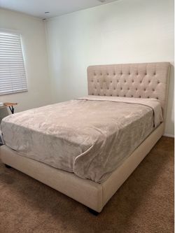 Upholstered Tan Queen Bed frame Only