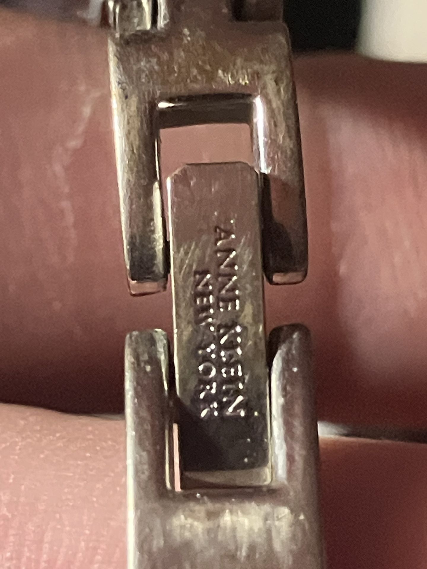 Anne Klein New York silver bangle bracelet with clear channel-set crystals