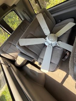White indoor  fan with light and put together and works