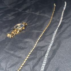 14k Gold Chain And A Silver Chain 