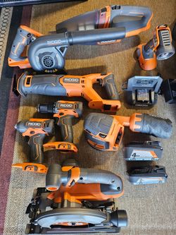 FIRM ON PRICE. Brand new 8 tool Ridgid combo kit with 2 batteries and charger