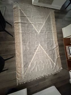 Boho Area Rug with Fringe and Geometric Pattern