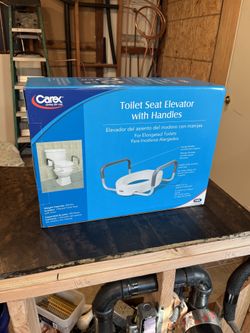 Toilet seat elevator