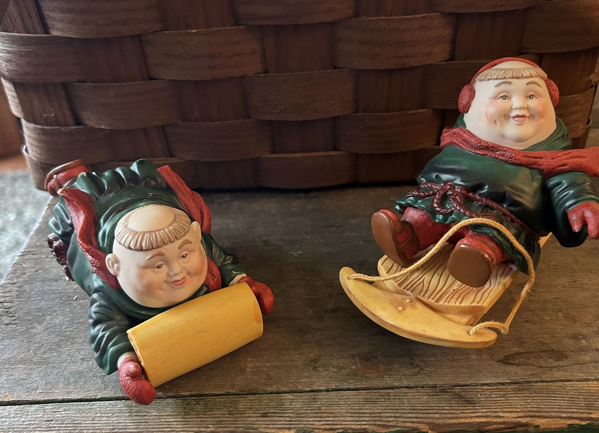 2 Vintage Dept 56 Porcelain Merry Makers Monks Friars Sled Toboggan Winter Christmas Figurines