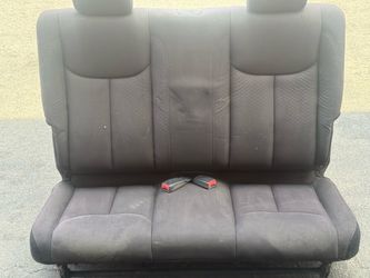 Back seat out of a 2015 jeep wrangler sport .