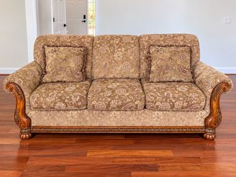 Traditional Floral Sofa with Carved Wood Arms