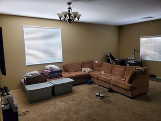 Brown tufted l shaped sectional sofa
