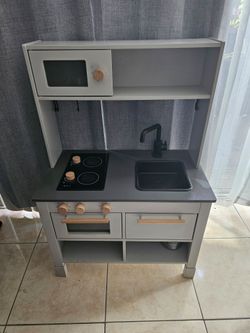 Wooden kitchen play area