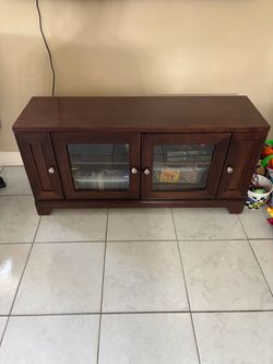 Dark Wood TV Stand with Glass Doors