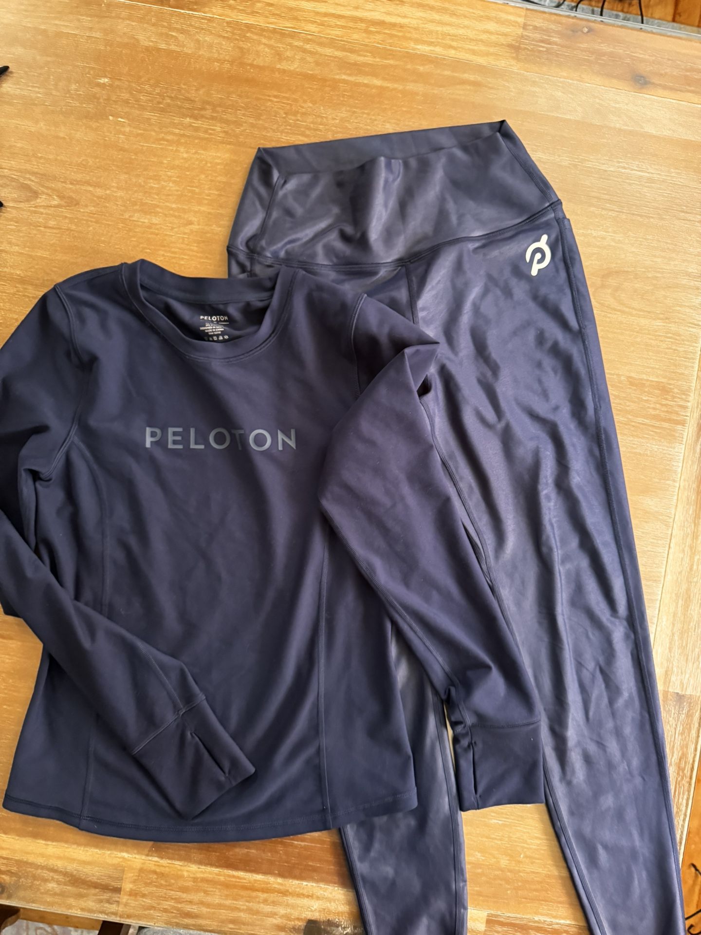  Women’s size medium Peloton Cadent Performance Long Sleeve shirt and Cadent High Rise Pocket Legging 