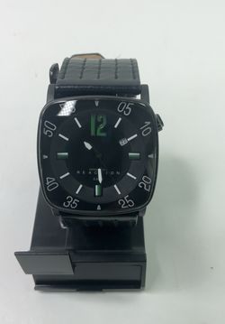 Kenneth Cole Reaction wristwatch features a square black case.