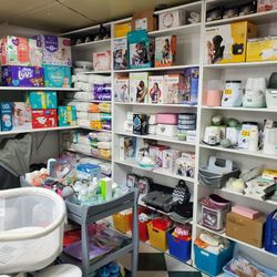 Baby Bottle Warmer,  Wipe Warmer,  Sterilizer,  Diaper Genie,  Baby Carrier,  & Diapers 