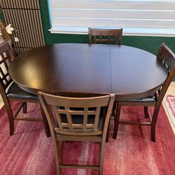 Bar-height extendable dining table with 4 chairs $250 OBO
