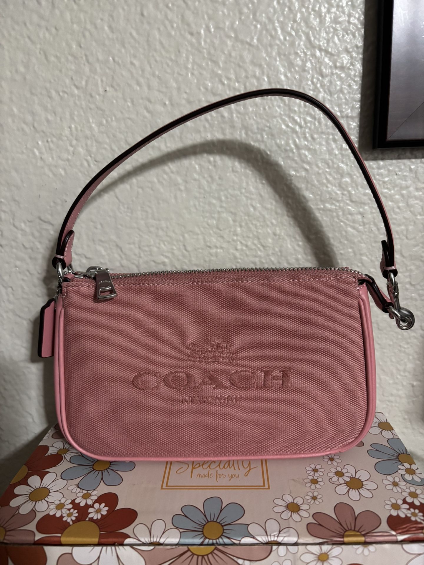 Coach Nolita19 pink clutch
