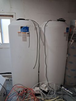 225 Gallon Water Tanks (2 available)