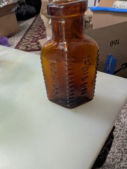 Brown poison bottle
