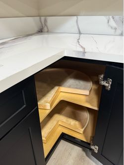 Cabinets of kitchen color black