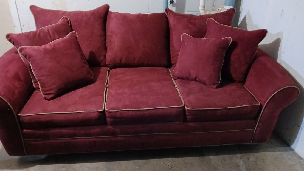 Super Comfortable, Suade/ Leather Like Material. Practically Brand New. Very Deep And Long Sofa.