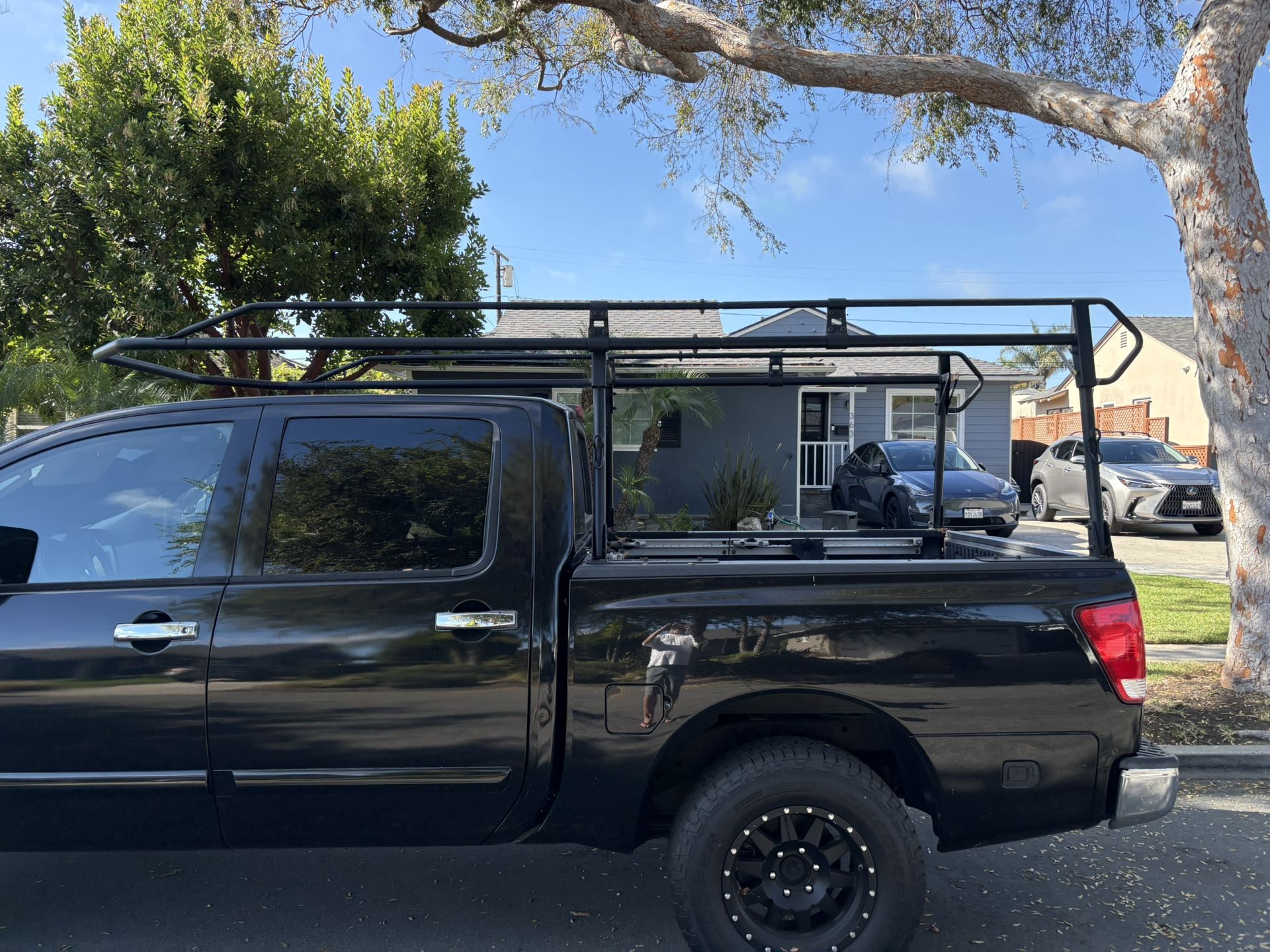 Lumber Rack, Kayak, And Long Boards