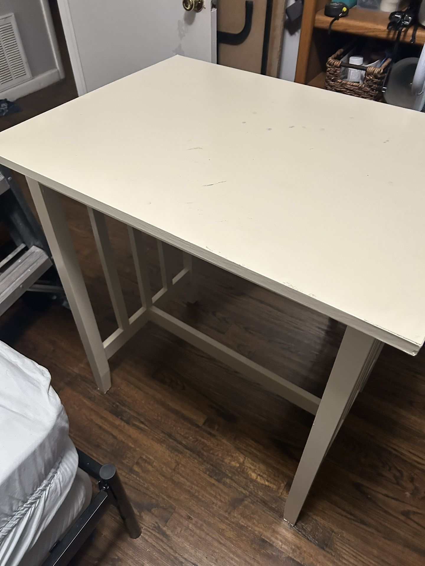 Bar still height table great condition sturdy could use a coat of paint no chairs asking 60 dimensions 34 wide 24 deep 31 tall need gone