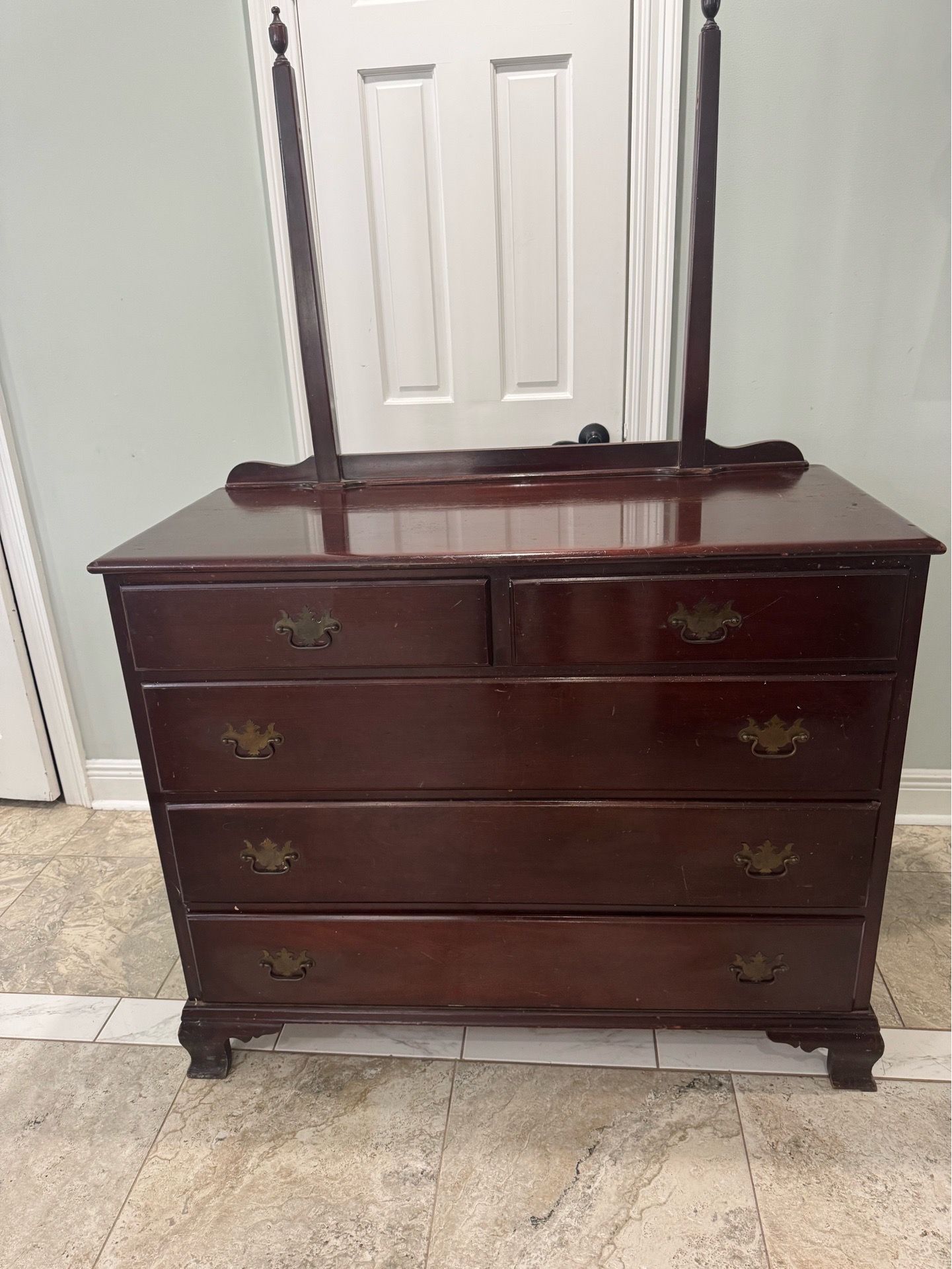 Antique dresser with three wide drawers and two small.Sturdy wood