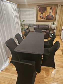 Tables, Chairs, Chaffing Dishes, and Drink Despenser