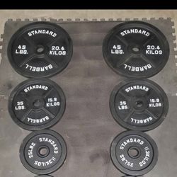 Olympic Weight Set Includes 2x45lbs 2x35lbs 2x25lbs Thats 210lbs all together selling all for $225..