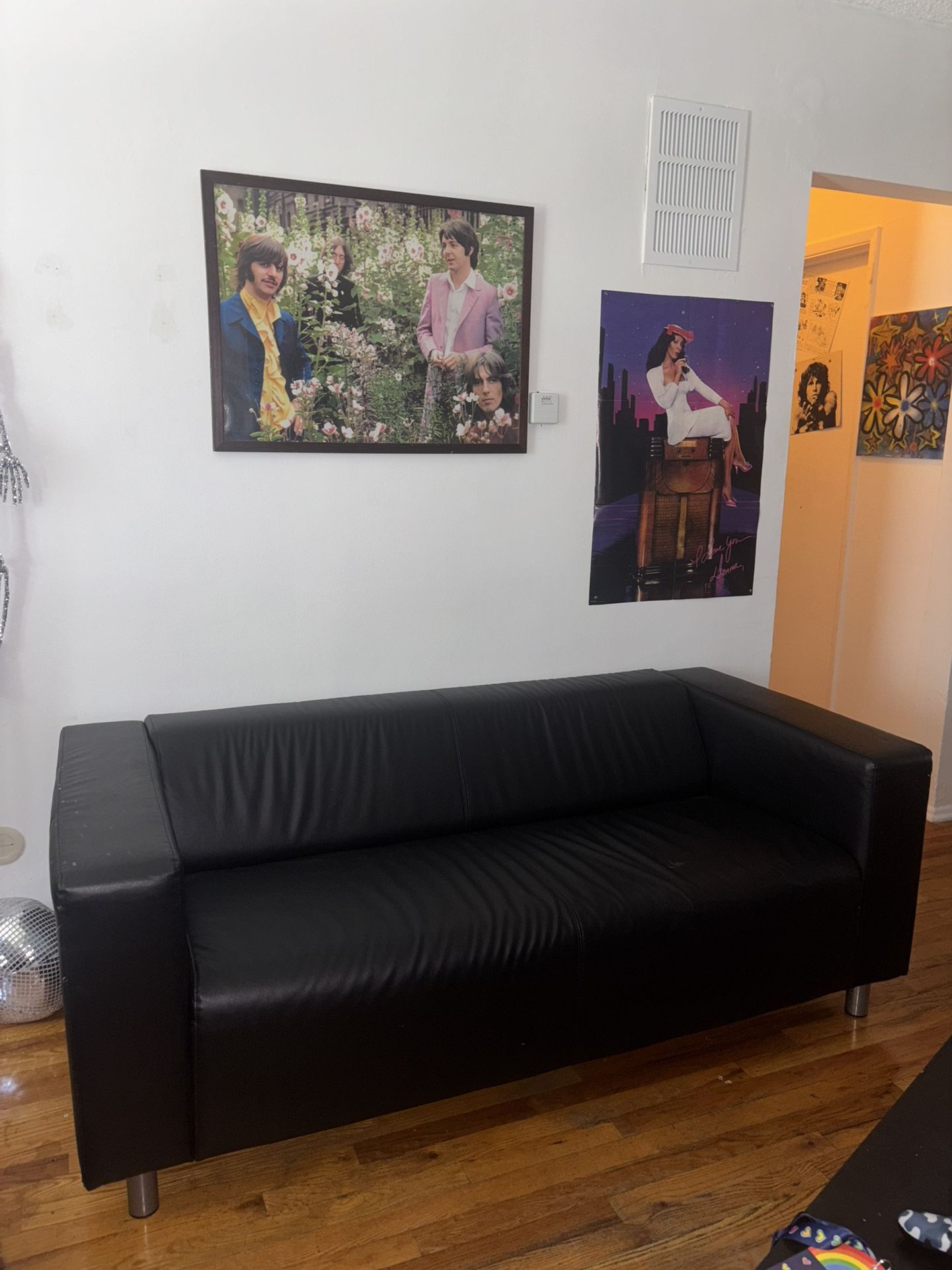 Black leather Mid Century Couch