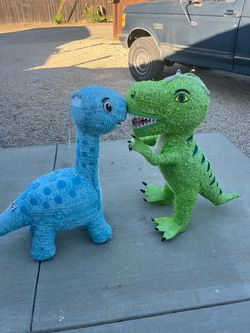 2 dinosaur Piñatas