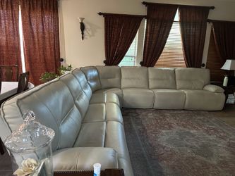 white faux leather couch