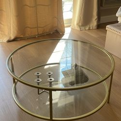 Round coffee table with glass shelf