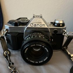 Vintage Canon AE-1 Program 35mm Film Camera with 50mm f/1.8 Lens