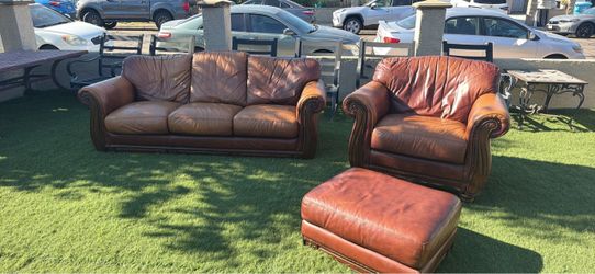 Brown Leather Sofa, Chair, and Ottoman Set