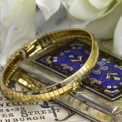 14k yellow gold Omega bracelet 