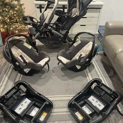 Baby Trend Sit N’ Stand Double Stroller With 2 Car Seats And Bases.