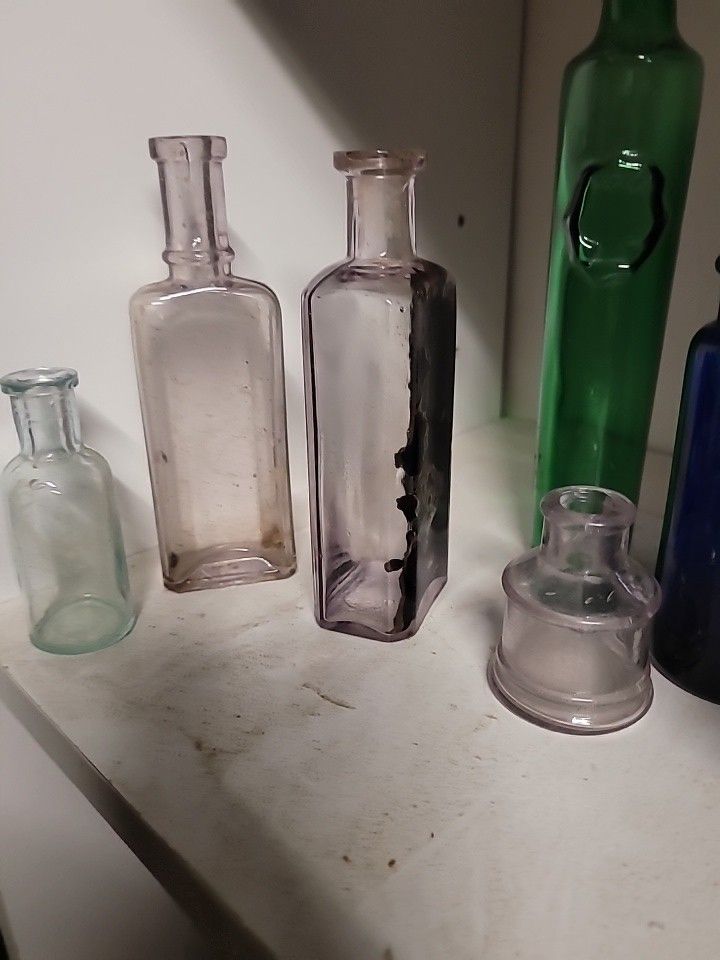 antique glass color bottles
